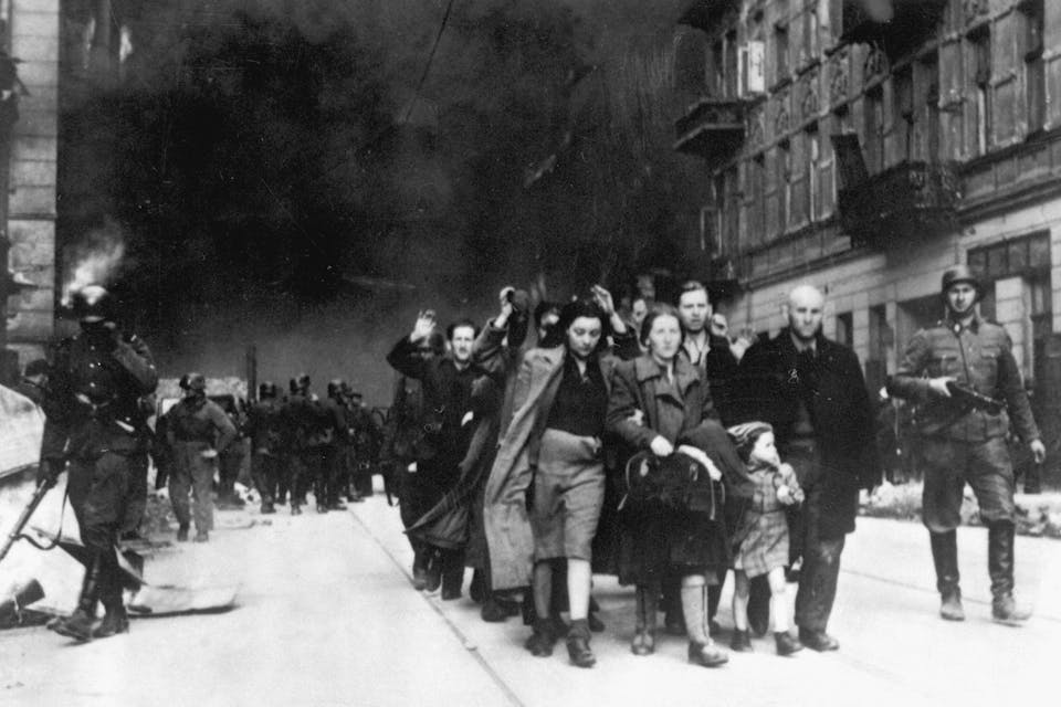 *Jews in the Warsaw Ghetto are lead to a deportation point sometime between April 19 and May 16, 1943. *Wikipedia. Jewish civilians.  Copy of German photograph taken during the destruction of the Warsaw Ghetto, Poland, 1943.   (WWII War Crimes Records)
Exact Date Shot Unknown
NARA FILE #:  238-NT-282
WAR & CONFLICT BOOK #:  1280