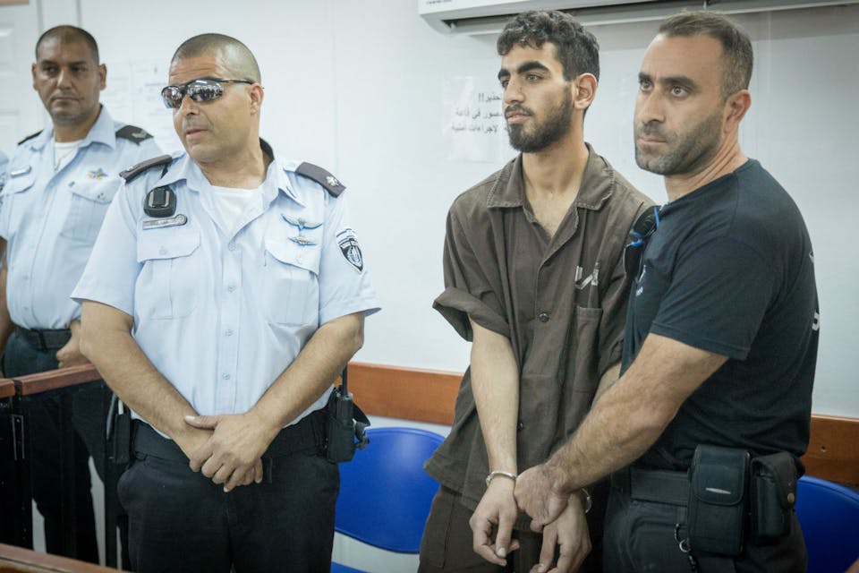*A Palestinian man is brought to the courtroom for a trial in Israel's Ofer military court on August 17, 2017.* Yonatan Sindel/Flash90. WInk Main
