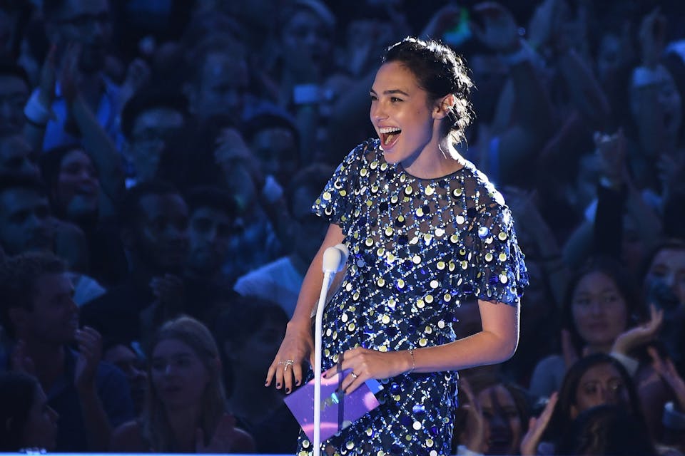 *Gal Gadot speaks in her light Hebrew accent onstage during the 2017 MTV Video Music Awards on August 27, 2017 in Inglewood, California.* C Flanigan/Getty Images. Gal-Hebrew
