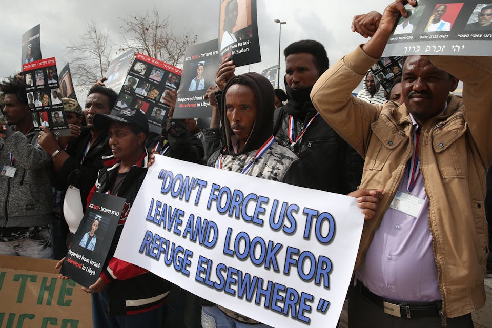 *African asylum seekers, mostly from Eritrea, in Israel in 2017.* MENAHEM KAHANA/AFP/Getty Images. Eritreans