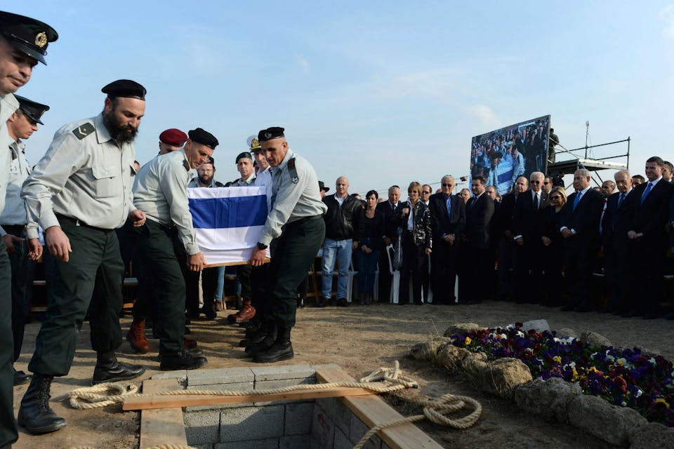 *The funeral of Ariel Sharon on January 13, 2014 in Havat Hashikmim, Negev, Israel.* Kobi Gideon / GPO via Getty Images. funeral