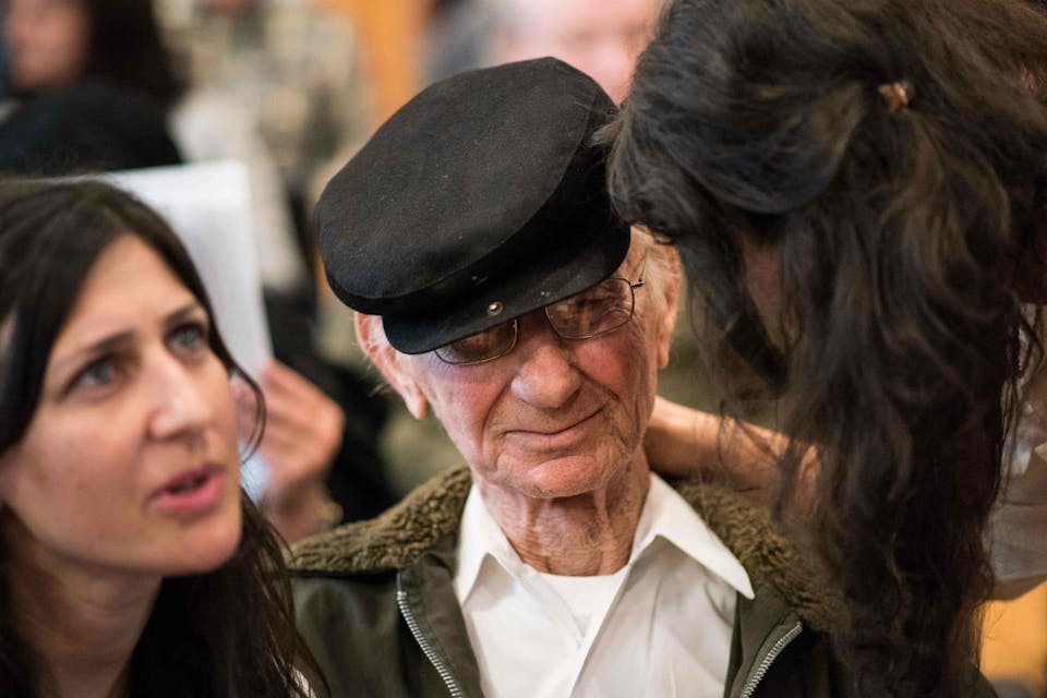 *Holocaust survivor Joshua Kaufman with his daughters Rachel and Alexandra.* BERND THISSEN/AFP/Getty Images. Survivor