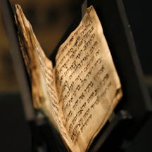 *A 1,200-year-old siddur, the oldest known copy in existence, is displayed at the Bible Lands Museum in Jerusalem.* GALI TIBBON/AFP/Getty Images. siddur