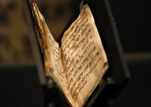 *A 1,200-year-old siddur, the oldest known copy in existence, is displayed at the Bible Lands Museum in Jerusalem.* GALI TIBBON/AFP/Getty Images. siddur