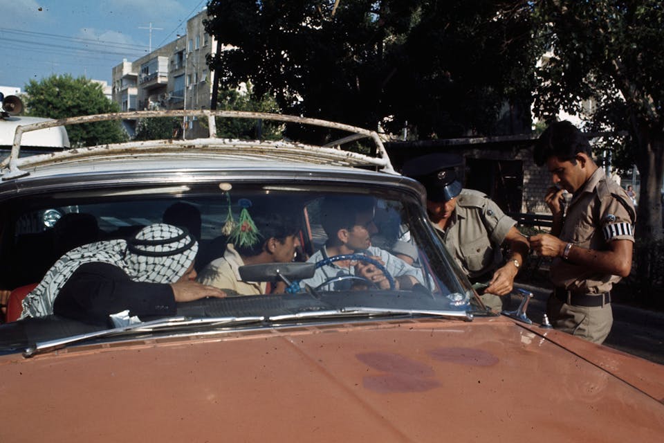 *Palestinians in a car checked by Israeli soldiers in July 1967.* Manuel Litran/Paris Match via Getty Images. Milson-Main