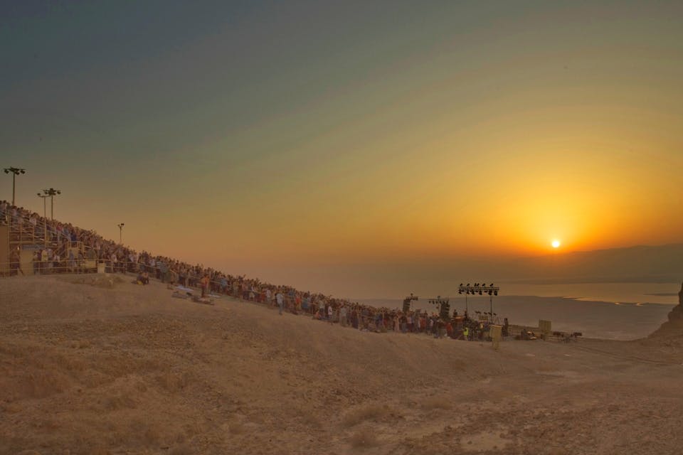 *The Israeli musician David Broza performing at Masada on Tu b'Av in 2012.* Avinoam Michaeli/Piki Wiki. tubav-altered