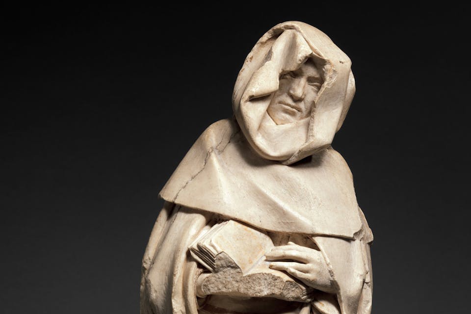 *A mourning figure in alabaster, ca. 1453, France, begun by Jean de Cambrai and completed by Étienne Bobillet and Paul de Mosselman.* The Metropolitan Museum of Art. mourner-crop