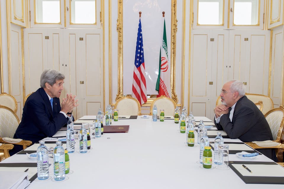 *U.S. Secretary of State John Kerry sits across from Iranian Foreign Minister Javad Zarif during a meeting on Iran's nuclear program in Vienna, Austria, on 30 June 2015. *Photo by U.S. Department of State /Anadolu Agency/Getty Images. Nobel