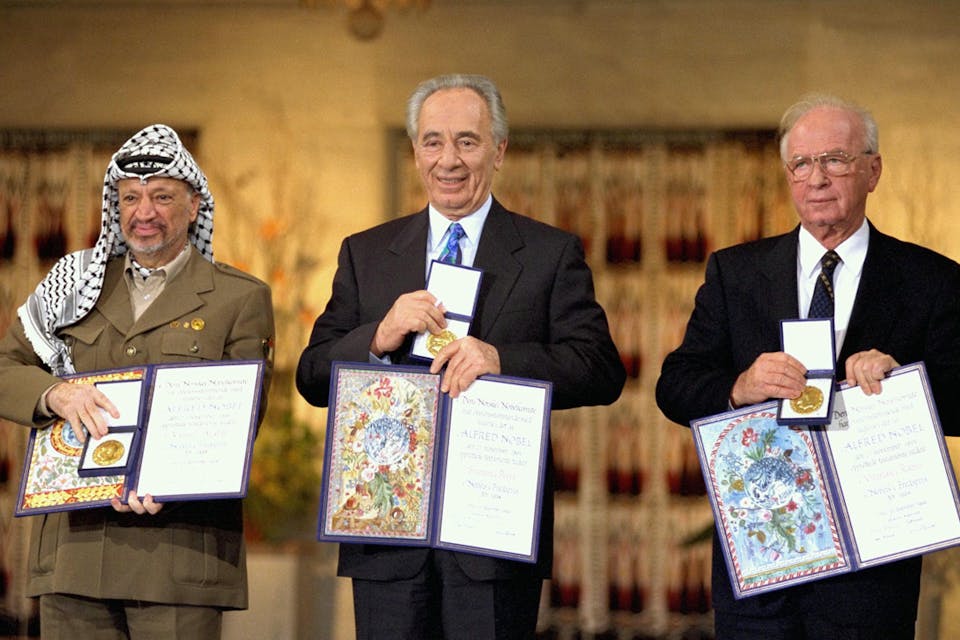 *Yasser Arafat, Shimon Peres, and Yitzhak Rabin with their Nobel Peace Prizes in Oslo in 1994. *Wikipedia. Nobel-Main