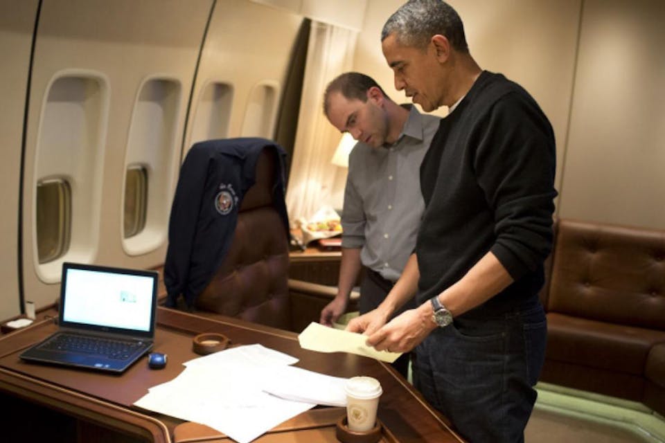 *Deputy National Security Advisor Ben Rhodes and President Barack Obama edit a speech on Air Force One in 2013. *Official White House photo by Pete Souza. Obama-Rhodes