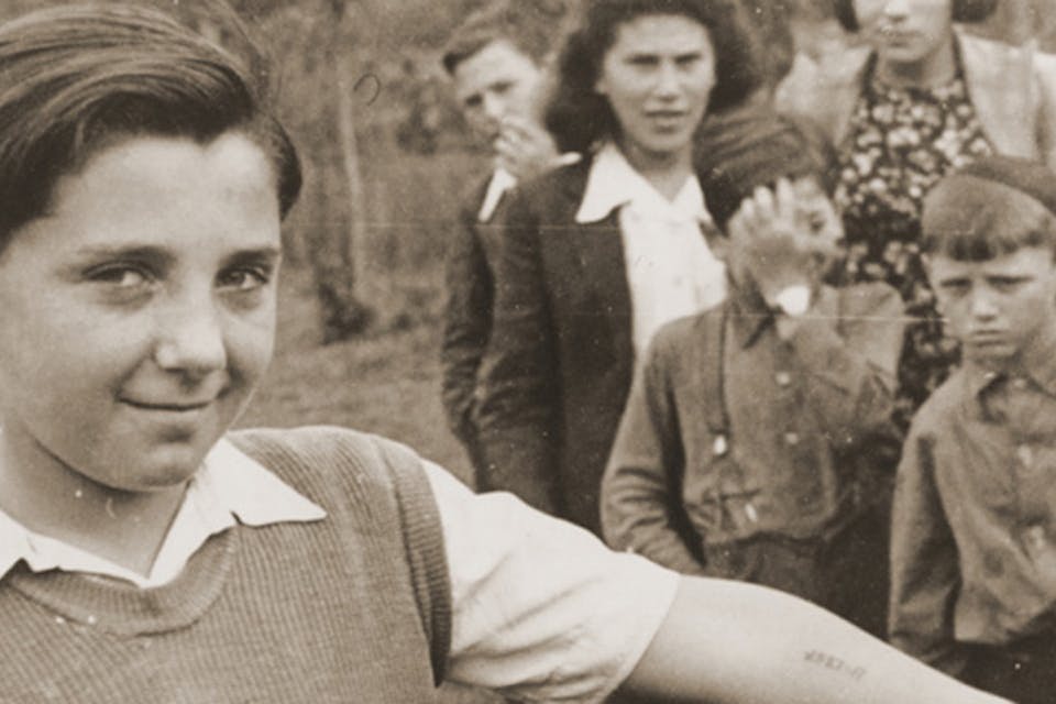 *A boy at the Neu Freimann displaced persons camp outside Munich.* Courtesy of the US Holocaust Memorial Museum. Tattoo-Child-Big