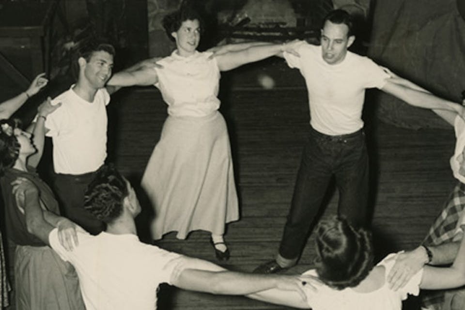*Young Jewish men and women dance in a circle, circa 1950.* From the digital collection of the Center for Jewish History. Circle-Dance-Big
