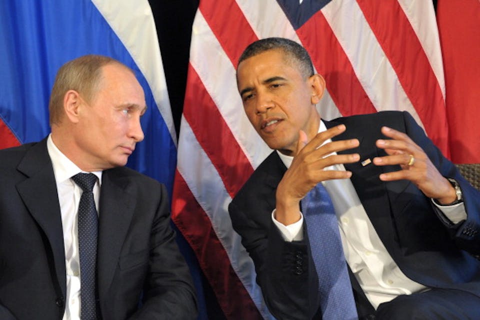 *Vladimir Putin and Barack Obama discuss the situation in Syria at the 2012 G20 Summit in Mexico. *Photo credit: ALEXEI NIKOLSKY/AFP/GettyImages 1465393131
