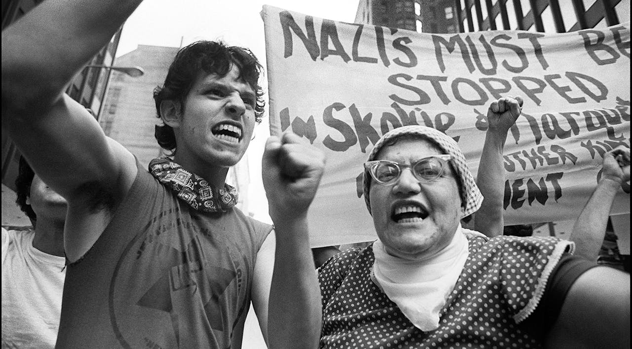 Two anti-Nazi demonstrators during a counter-protest to a nearby neo-Nazi rally in Illinois on June 24, 1978. *Chuck Fishman/Getty Images*. Skokie Main