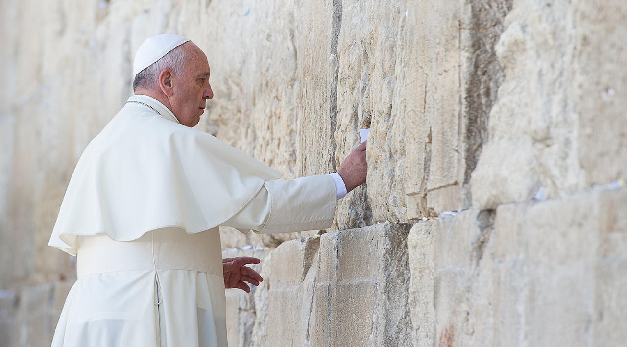 *Pope Francis at the Western Wall in May 2014.* Eric VANDEVILLE/Gamma-Rapho via Getty Images. Pope Wall Main