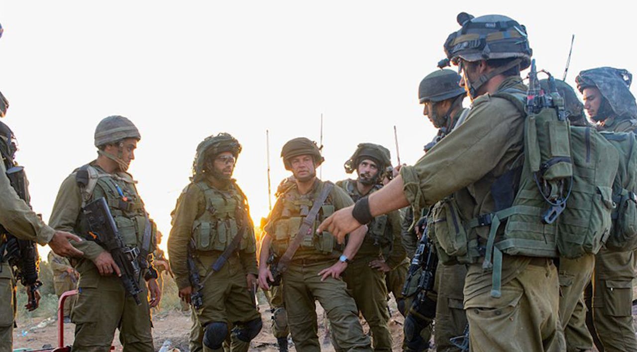 *IDF paratroopers search for hidden tunnels used by Hamas to attack Israel.* Photo by the IDF Spokesman Unit. Abrams-Cover