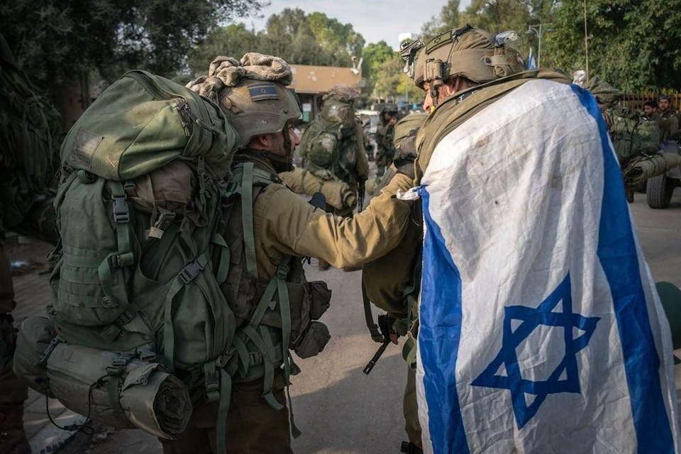 Israeli soldiers during the early days of the war. *IDF Spokesperson’s Unit*. whatsapp-image-2023-10-17-at-21-11-43-1