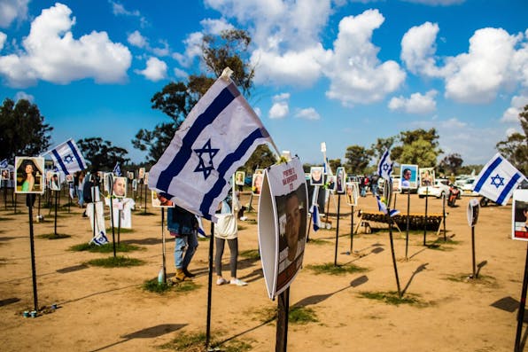 A memorial to the Israelis killed by Hamas at the NOVA music festival on October 7. *Image via Shutterstock*. oct-7-symposium