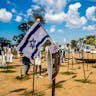 A memorial to the Israelis killed by Hamas at the NOVA music festival on October 7. *Image via Shutterstock*. oct-7-symposium