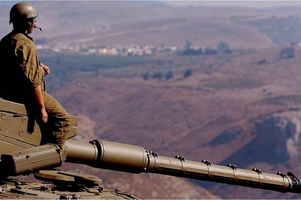An Israeli armored soldier overlooks Lebanon during the 2006 Second Lebanon War. 640px-2006_Lebanon_War._IV