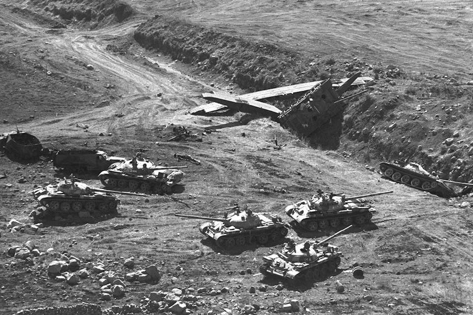 Destroyed Syrian tanks and engineering equipment on October 13, 1973 in the Golan Heights. *Eitan Haris/GPO/Getty Images*. Shamir Main