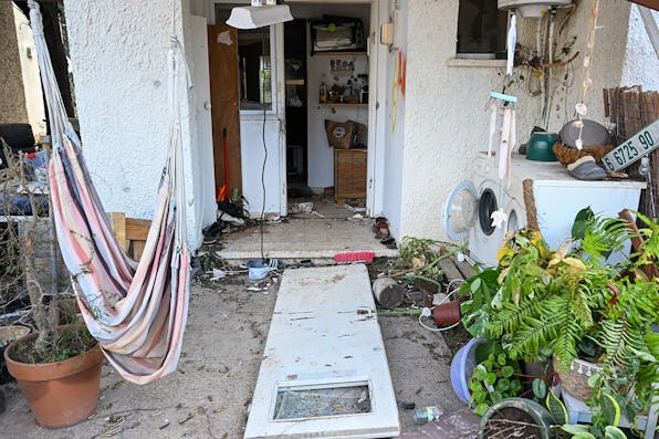 The destroyed front of a house in Kfar Aza, Israel on October 15, 2023, days after Hamas terrorists attacked the kibbutz. *Alexi J. Rosenfeld/Getty Images*. DeMogge Gaza Main