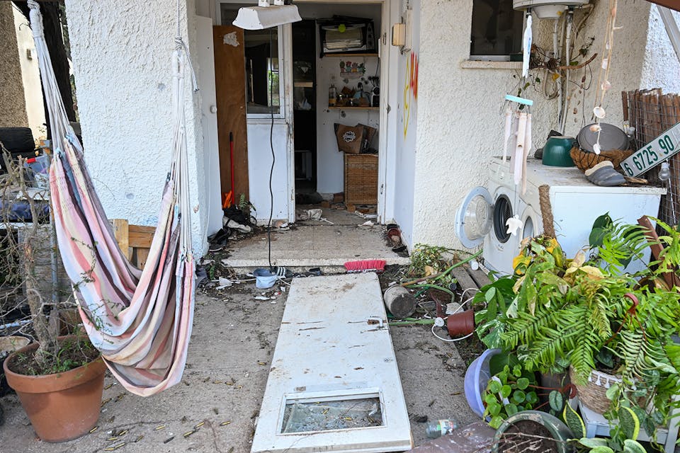 The destroyed front of a house in Kfar Aza, Israel on October 15, 2023, days after Hamas terrorists attacked the kibbutz. *Alexi J. Rosenfeld/Getty Images*. DeMogge Gaza Main