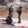 Israeli servicemen in the southern town of Sderot on October 8, 2023. *Chaim Goldberg/Flash90*. Namer Main