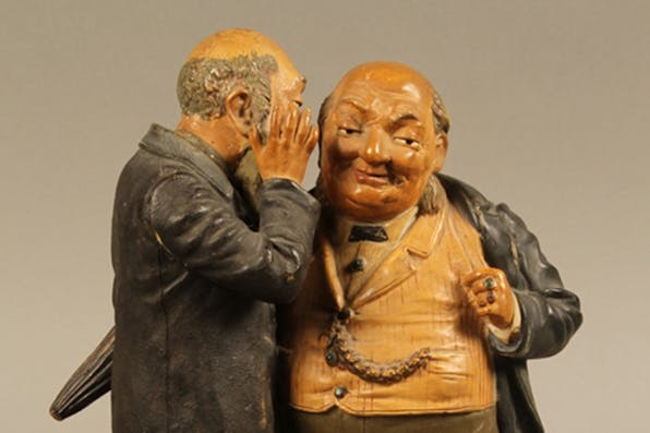 A painted figure group of a poor Jew whispering to a wealthy merchant, made in Germany ca 1900. *United States Holocaust Memorial Museum Collection, Gift of the Katz Family.* Burton Response Main