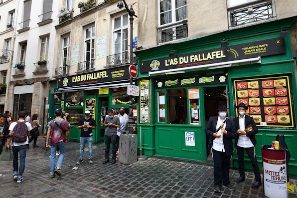 L’As du Fallafel restaurant in the Marais district, hosting one of Paris’s main Jewish communities, on July 24, 2020. *Frédéric Soltan/Corbis via Getty Images.* Schmitz Main