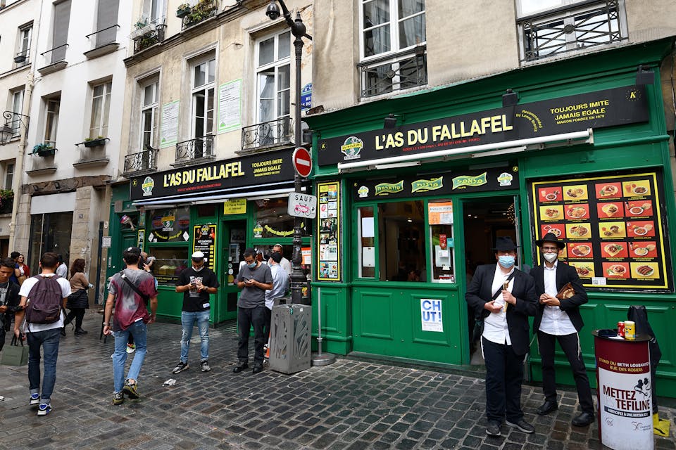 L’As du Fallafel restaurant in the Marais district, hosting one of Paris’s main Jewish communities, on July 24, 2020. *Frédéric Soltan/Corbis via Getty Images.* Schmitz Main