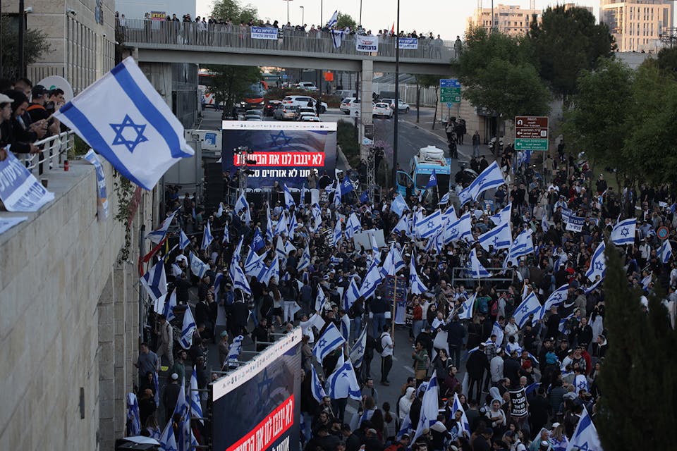 Right-wing pro-reform protestors outside the Knesset in Jerusalem on March 27, 2023. *Saeed Qaq/Anadolu Agency via Getty Images.* Barak-Corren Main