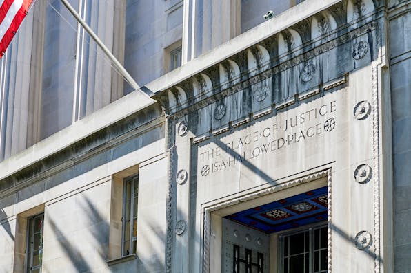 The entrance to the Robert F. Kennedy Department of Justice building in Washington, D.C. *wingedwolf/iStock*. Rienzi Reply Main