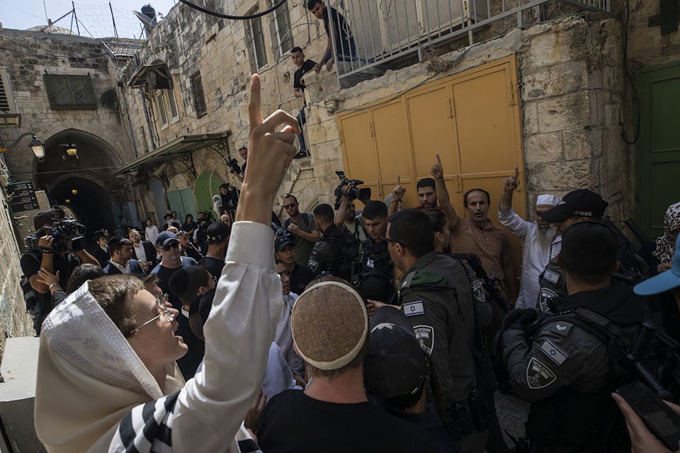 Palestinians, Jewish settlers, and Israeli forces clash at the Temple Mount on August 7, 2022. *Mostafa Alkharouf/Anadolu Agency via Getty Images.* Inbari Response