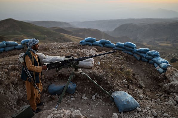 An Afghan militia fighter in Balkh Province on July 11, 2021. *FARSHAD USYAN/AFP via Getty Images*. Sasse Main