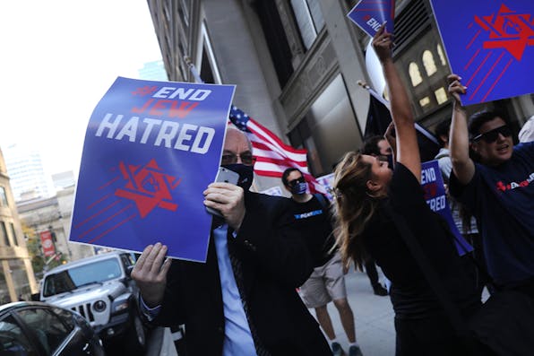 Protesters rally in Manhattan on October 15, 2020. *Spencer Platt/Getty Images*. Goldman Wisse Main