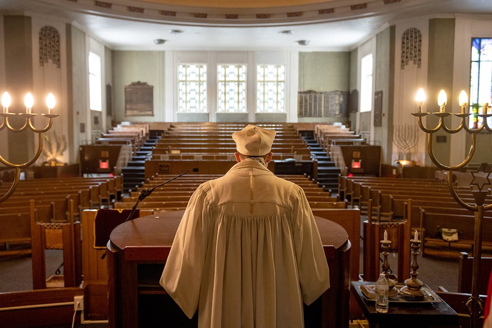 Student cantor Kalix Jacobson, wearing traditional white cantorial attire, rehearses for the High Holidays services at Hebrew Tabernacle of Washington Heights on September 17, 2020 in New York City. *Photo by Alexi Rosenfeld/Getty Images.* Wertheimer LW