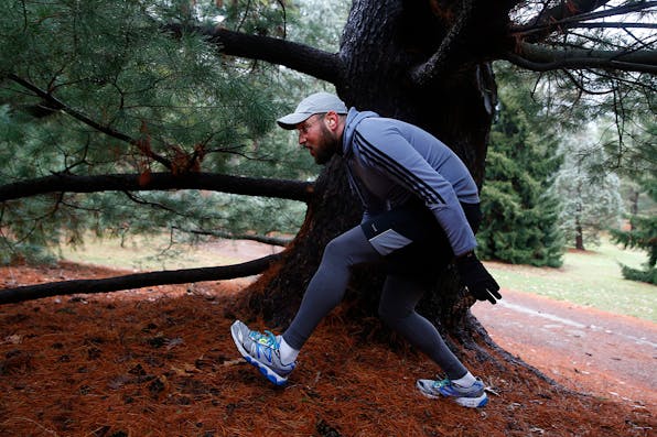 A rabbi from Boston’s Temple Israel searches for pine cones for Passover on March 29, 2017. Congregants of Boston’s largest Reform synagogue gather pine cones as a symbolic reminder of the need for penal reforms in the state. *Jessica Rinaldi/The Boston Globe via Getty Images.* Moscowitz Main