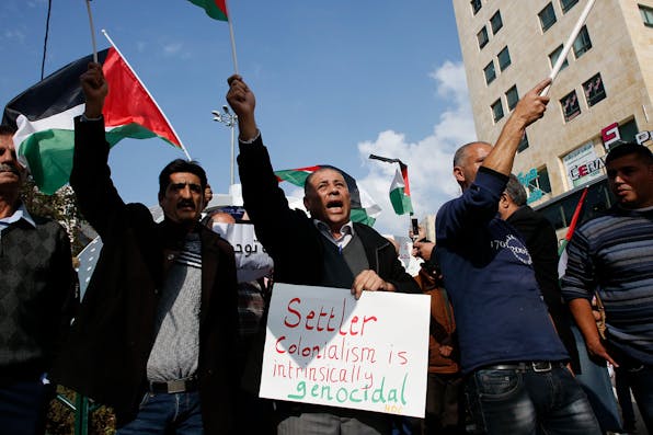 Palestinian protesters in Hebron on November 13, 2018. *HAZEM BADER/AFP via Getty Images.* Aboubakr Main