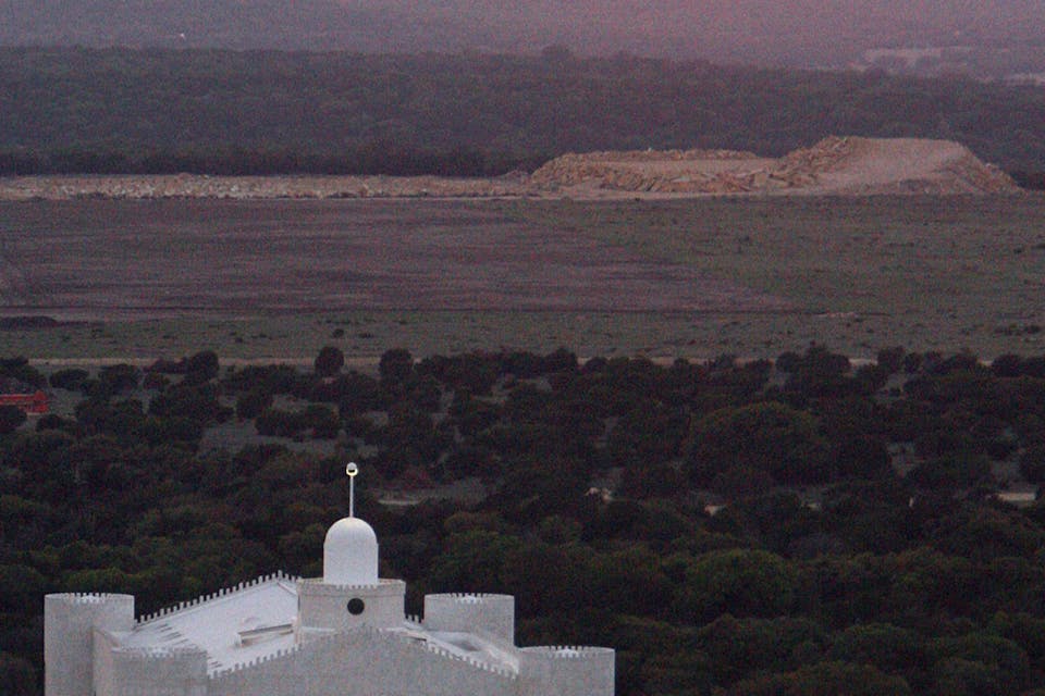 The sun over a Latter-day Saints compound in Texas. *Mike Terry/Deseret Morning News/Getty Images*. LDS Main