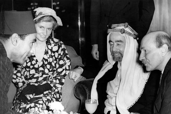 King Abdullah I of Jordan talking to a member of the Transjordanian Legation at the Dorchester Hotel, London, on September 1, 1949. With him are British Prime Minister Clement Attlee and Attlee’s wife Violet. *Edward Miller/Keystone/Hulton Archive/Getty Images.* Kramer Annexation Main