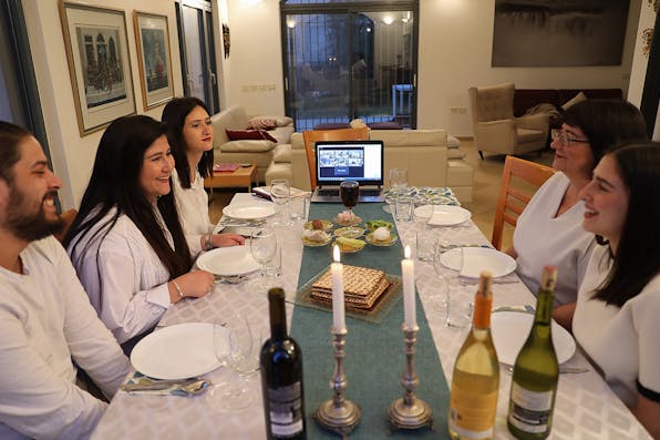 *An Israeli family at an online seder on April 8, 2020*. Nati Shohat/Flash90. Bouskila Main