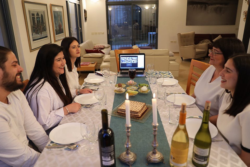 *An Israeli family at an online seder on April 8, 2020*. Nati Shohat/Flash90. Bouskila Main