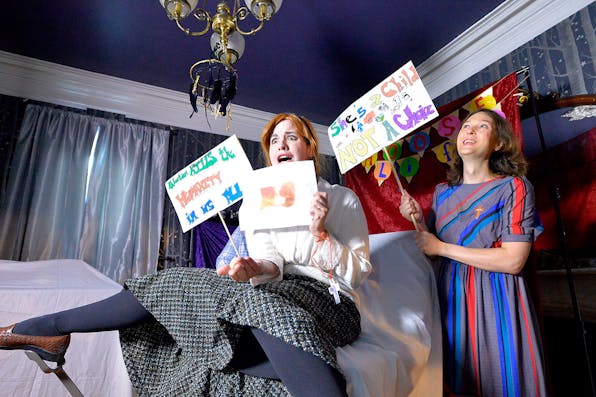 *Actors mocking Christianity at a satanic temple in Salem, Massachusetts on October 8, 2019.* JOSEPH PREZIOSO/AFP via Getty Images. Satanic Temple Actors Main