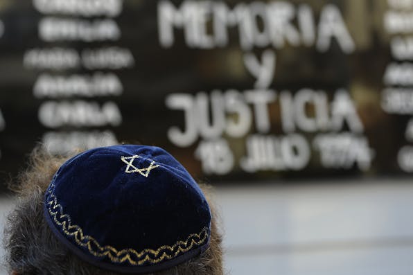 ALEJANDRO PAGNI/AFP/Getty Images. AMIA Kippah Main