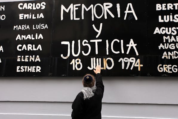 *An AMIA memorial in July 2019 in Buenos Aires, Argentina.* Carol Smiljan/NurPhoto via Getty Images. AMIA Memorial Main