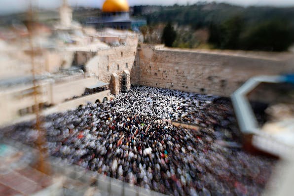*A blurred view of the Western Wall during Passover in April 2019.* THOMAS COEX/AFP/Getty Images. Jerusalem Blurred Main