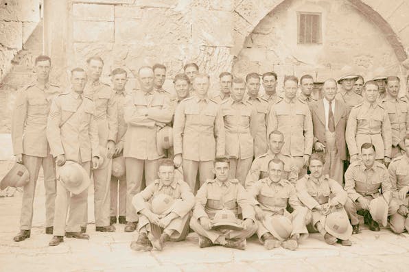 *A group of British soldiers in the court of the Church of the Holy Sepulchre in 1917 in Jerusalem.* Sepia Times/Universal Images Group via Getty Images. British Soldiers Sand Main
