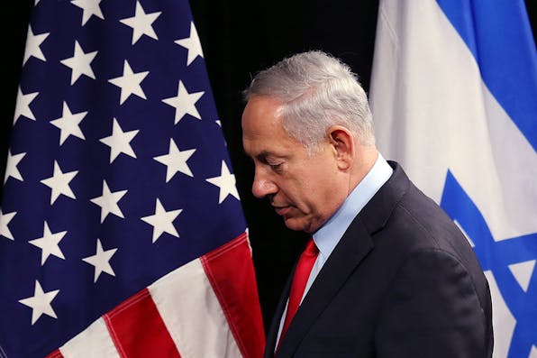 Justin Sullivan/Getty Images. netanyahu us and israeli flags