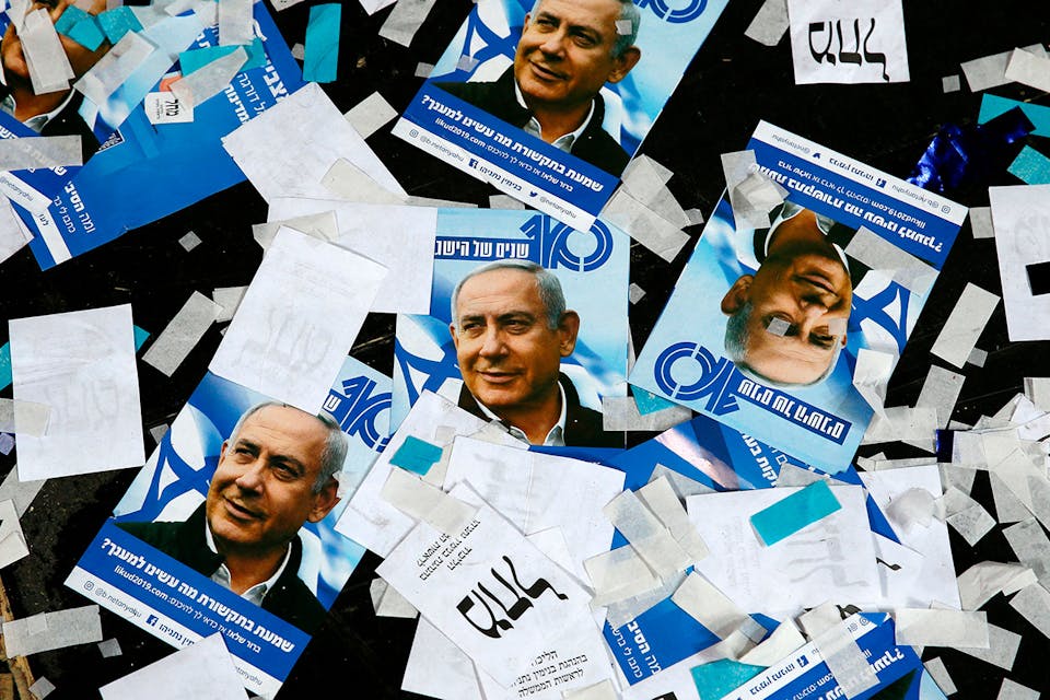 *Posters of Benjamin Netanyahu on the floor of Likud party headquarters on election night 2019.* JACK GUEZ/AFP/Getty Images. Netanyahu Posters 2019